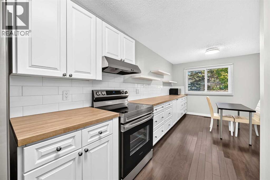 10304 Braeside Drive Sw, Calgary, Alberta  T2W 1B4 - Photo 5 - A2347476