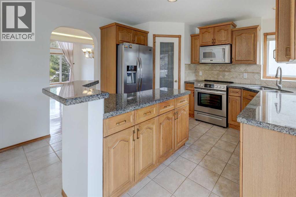 662 Arbour Lake Drive Nw, Calgary, Alberta  T3G 4T6 - Photo 8 - A2347162