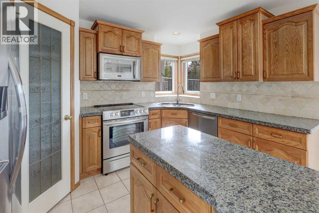 662 Arbour Lake Drive Nw, Calgary, Alberta  T3G 4T6 - Photo 9 - A2347162