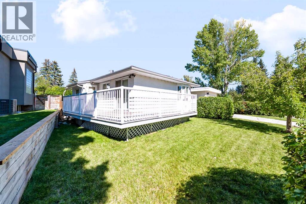107 Hallbrook Drive Sw, Calgary, Alberta  T2V 3H8 - Photo 5 - A2346389