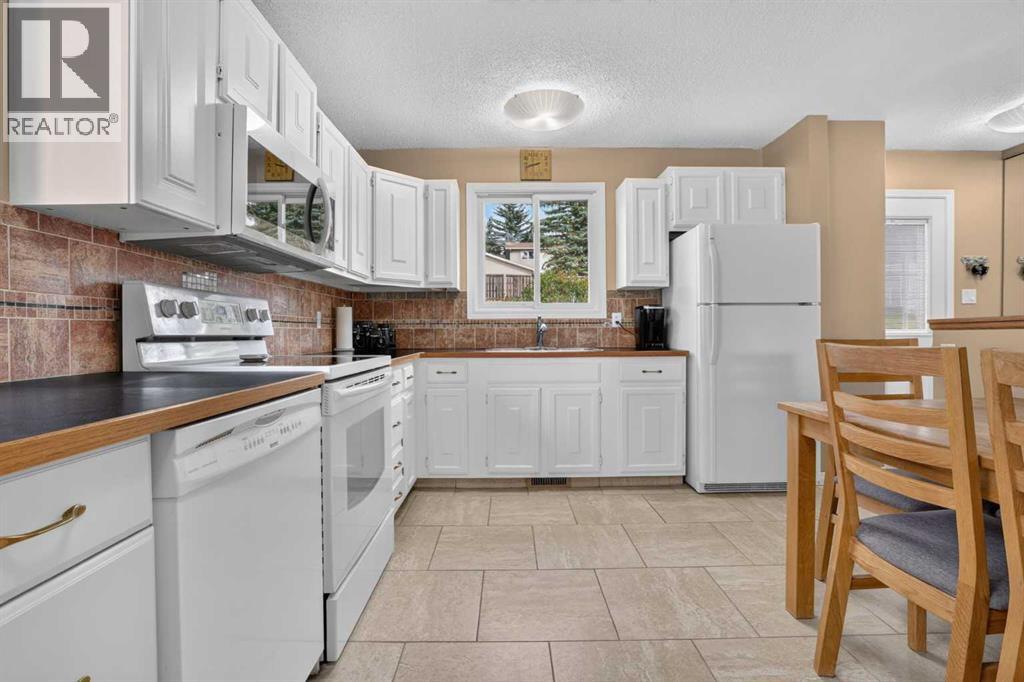 172 Queensland Road SE, Calgary, Alberta  T2J 3S2 - Photo 9 - A2333562