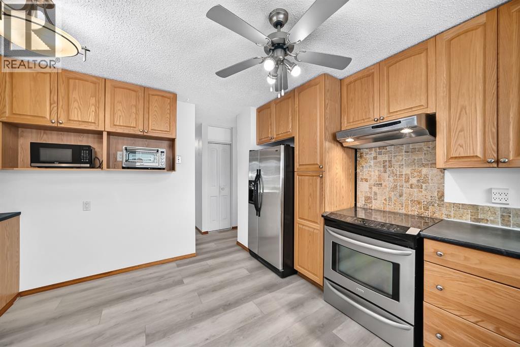 947 Maitland Way Ne, Calgary, Alberta  T2A 5M8 - Photo 5 - A2338420