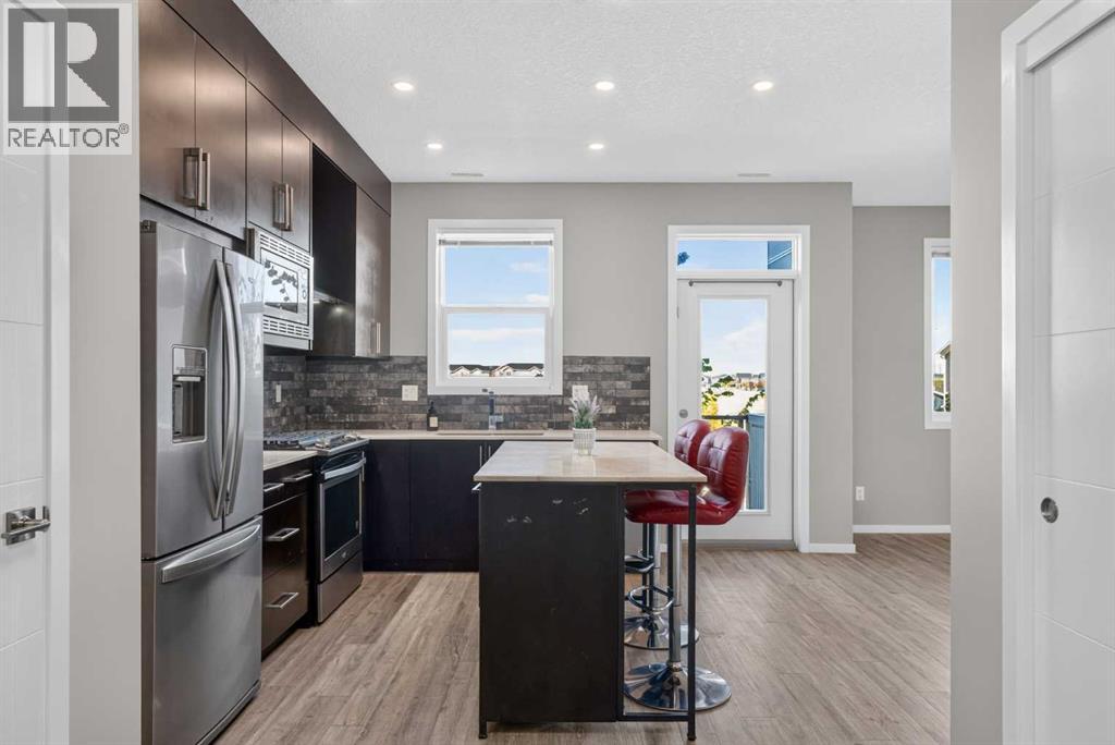203, 315 Redstone Walk NE