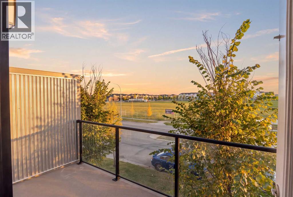 203, 315 Redstone Walk NE