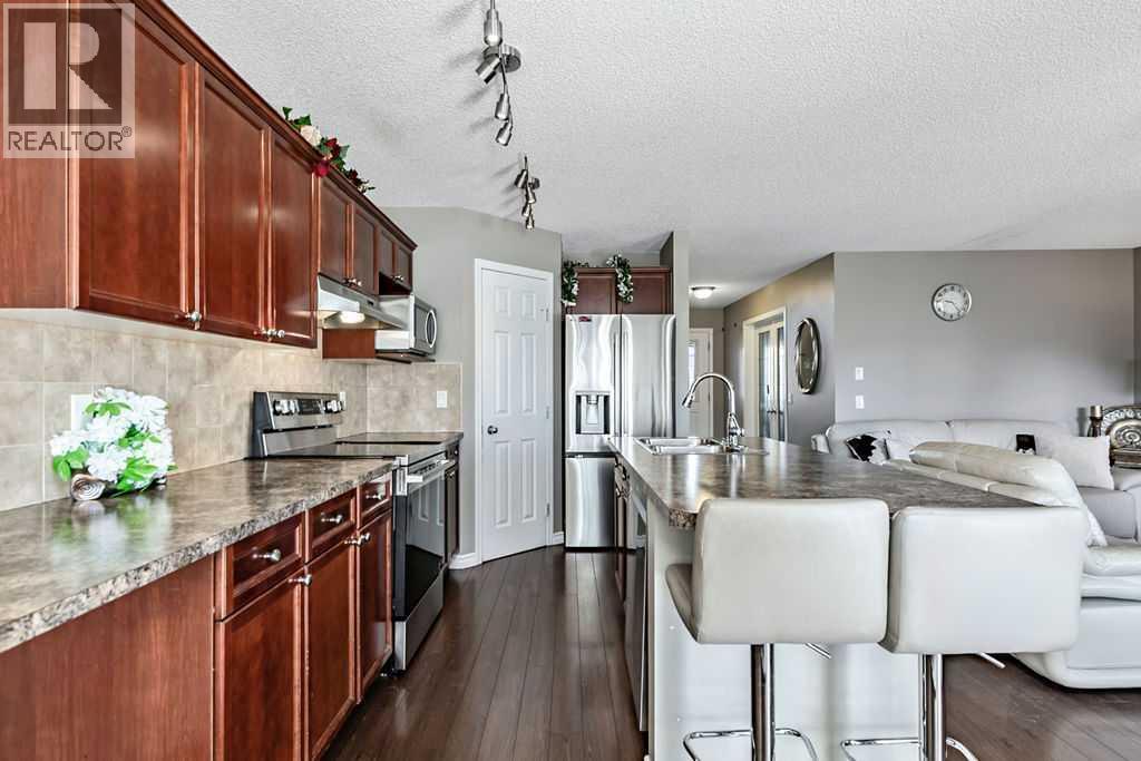 50 Cimarron Grove Way, Okotoks, Alberta T1S 2L9 - Photo 8 - A2350035