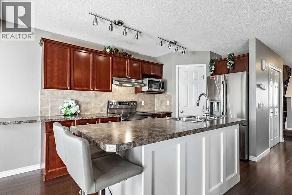 50 Cimarron Grove Way, Okotoks, Alberta T1S 2L9 - Photo 7 - A2350035