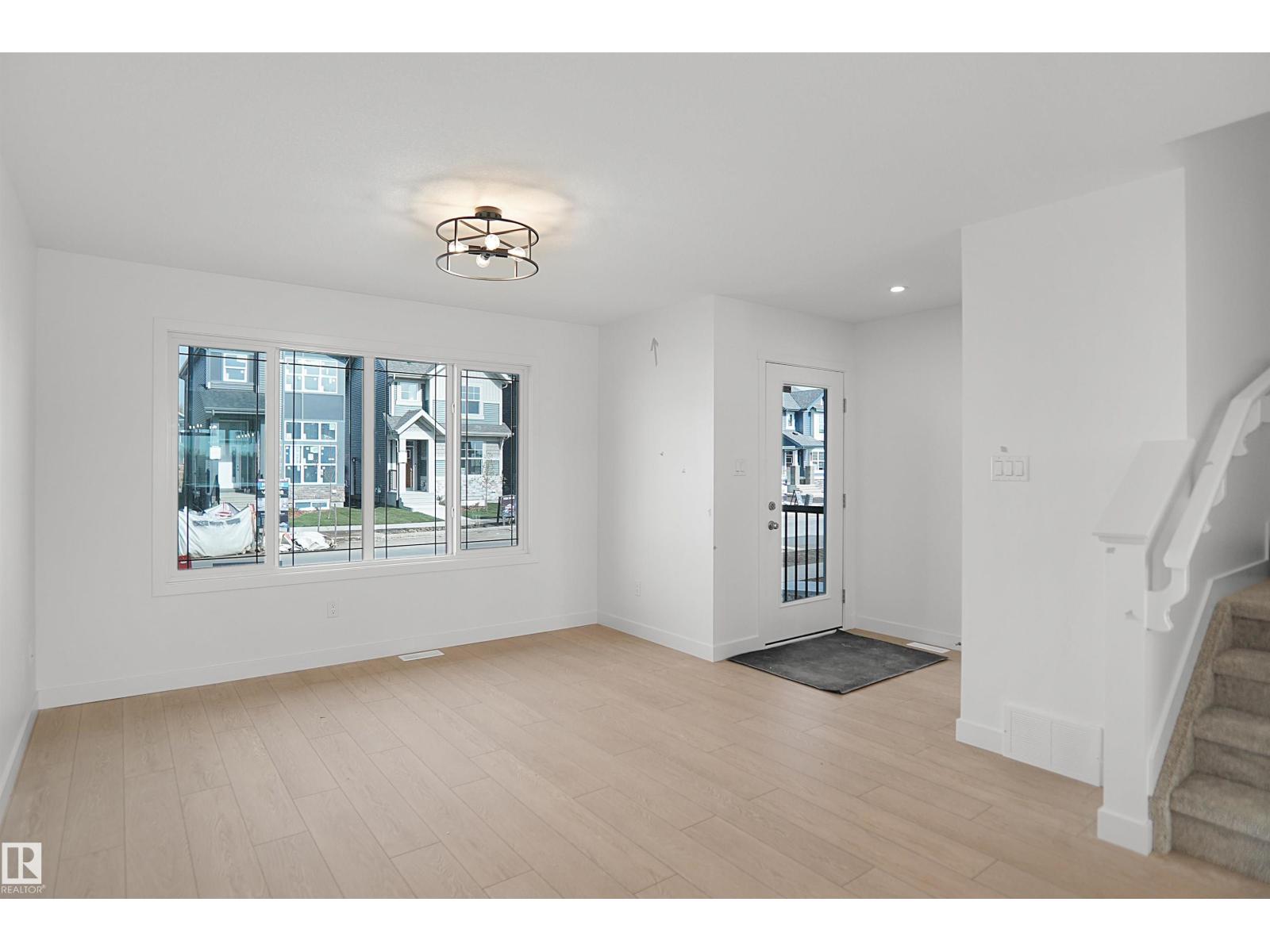 21139 25 AV NW
