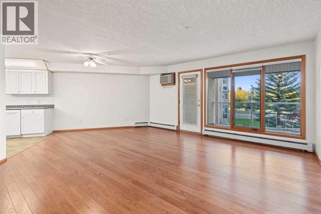 220, 7229 Sierra Morena Boulevard SW, Calgary, Alberta  T3H 3L8 - Photo 4 - A2345945