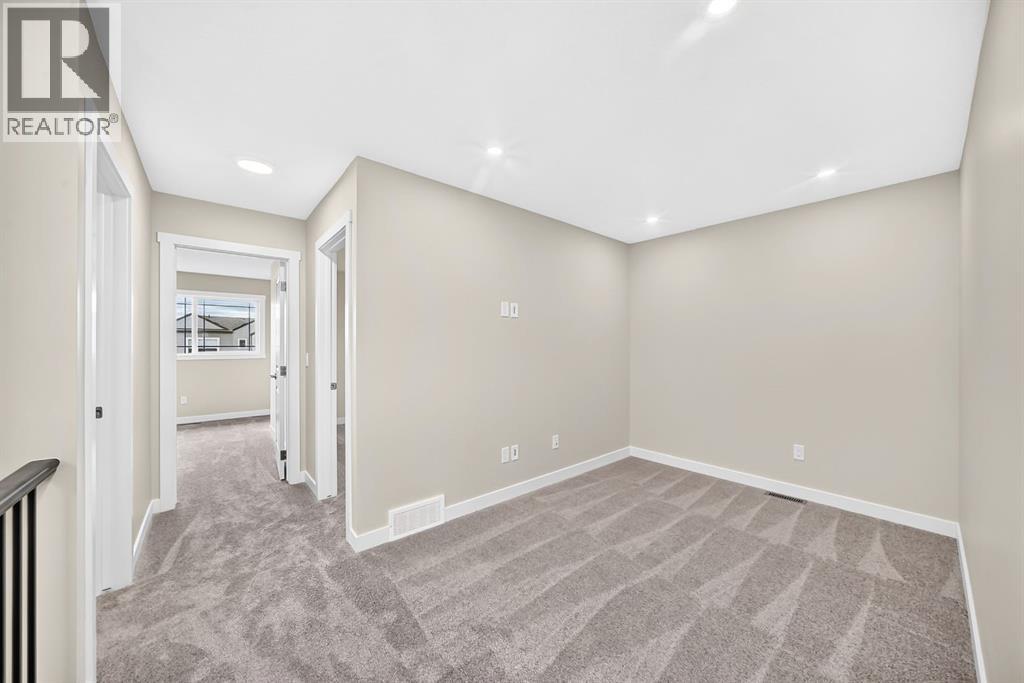 2274 Bayview Drive Sw, Airdrie, Alberta  T4B 5N6 - Photo 30 - A2349611