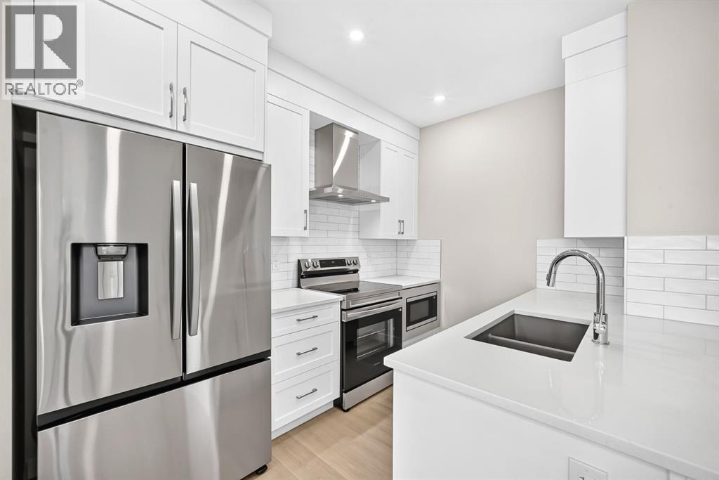 2274 Bayview Drive Sw, Airdrie, Alberta  T4B 5N6 - Photo 4 - A2349611