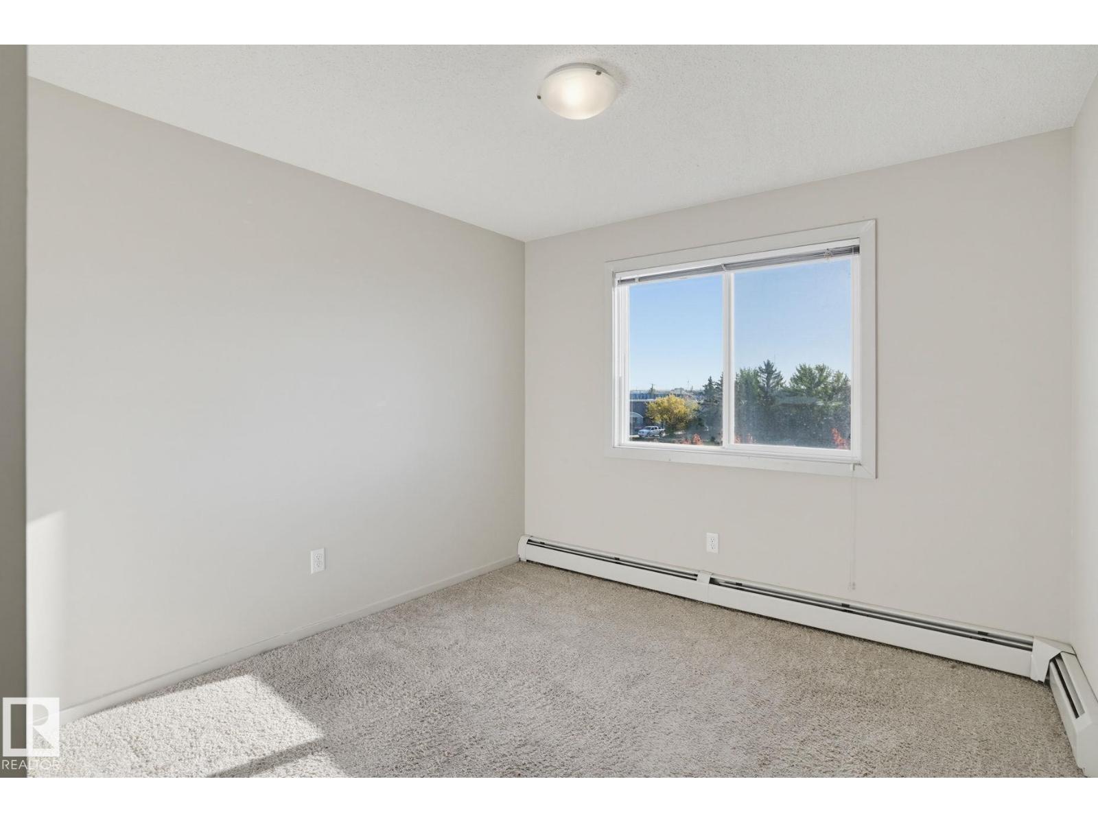 #316 7711 71 ST NW