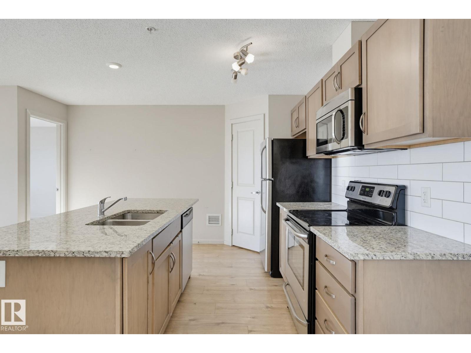 #316 7711 71 ST NW