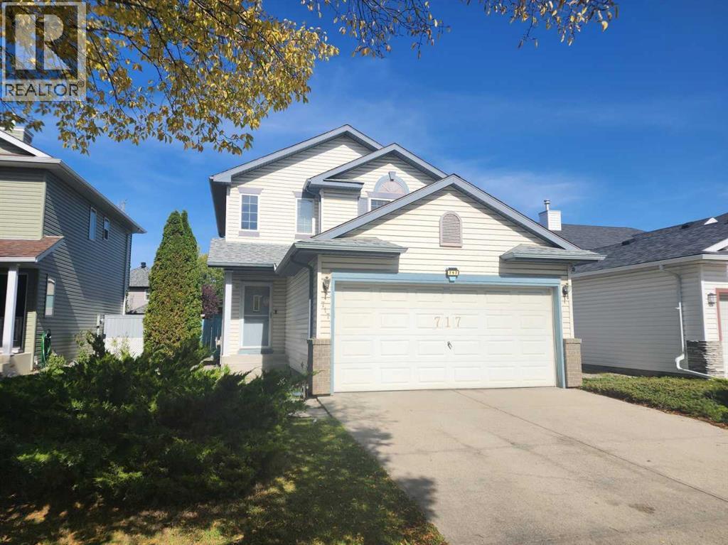 717 Harvest Hills Drive Ne, Calgary, Alberta  T3K 4R3 - Photo 1 - A2346907