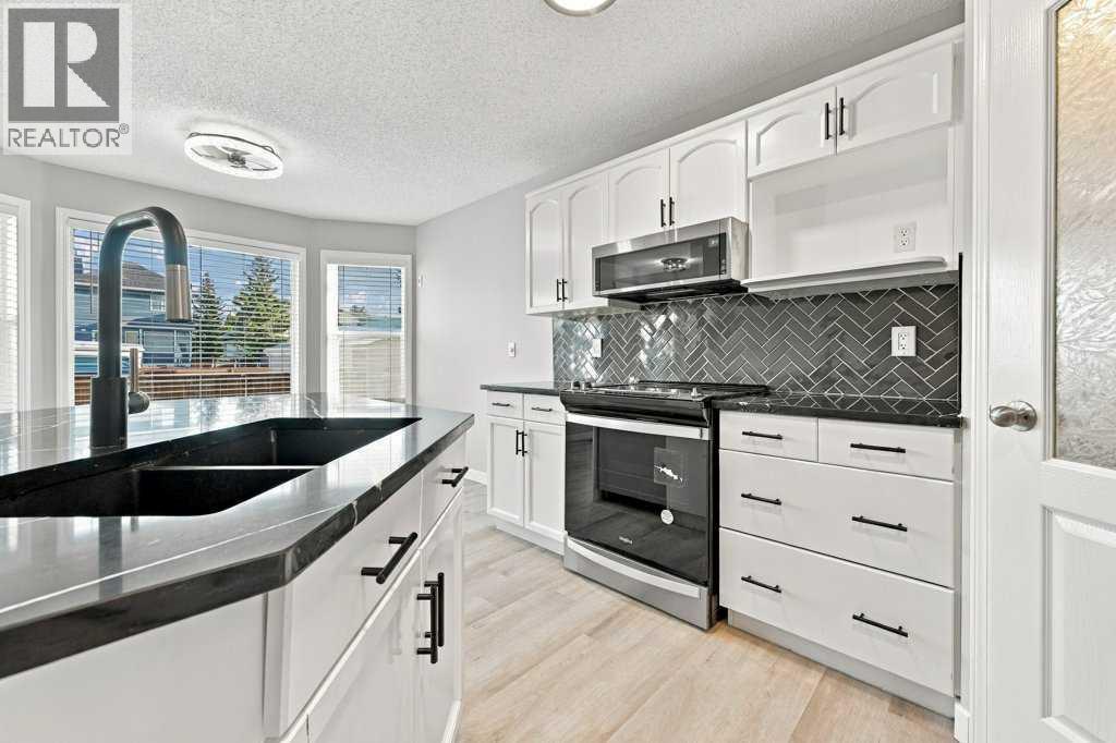 334 Bridlewood Court SW, Calgary, Alberta  T2Y 3T6 - Photo 5 - A2346203