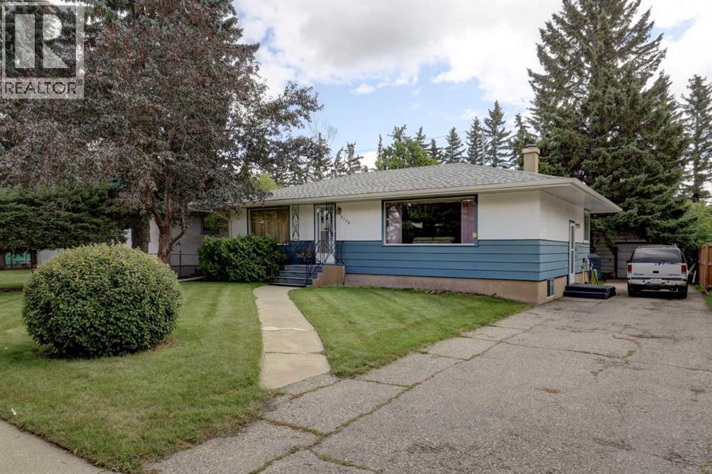 2119 Halifax Crescent NW, Calgary, Alberta  T2M 4C8 - Photo 2 - A2348639
