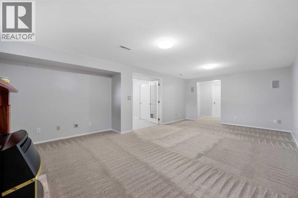 479 Bracewood Crescent SW, Calgary, Alberta  T2W 3B7 - Photo 6 - A2348213