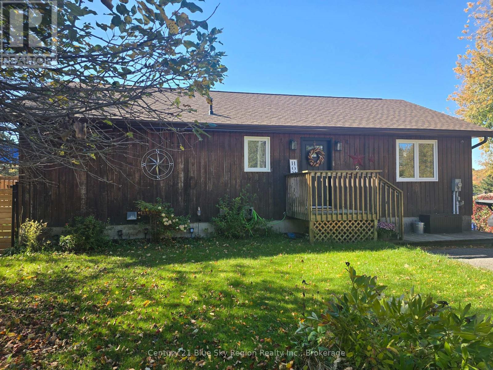 Welcome to 203 Labrecque in beautiful Bonfield! Set on a corner lot, this nicely updated bungalow offers a basement walkout to the backyard and lovely views of Lake Nosbonsing from its two balconies. Move-in ready and carpet-free, the home features new laminate flooring throughout, with tile in the basement office. The kitchen was updated in 2025 with new cabinets, a kitchen island, and granite countertops. Major improvements include a new furnace and heat pump with central air, new shingles (2025), and new windows, exterior doors, and patio doors (2024). A fresh coat of paint throughout much of the home adds to its welcoming feel. Enjoy your morning coffee or evening sunsets from either of the two replaced balconies-one off the kitchen and one off the living room-each with stairs leading down to the yard. Outside, a fenced 50-by-50-foot area is ready for your animals, and a newly poured 24-by-20-foot concrete pad is prepared for a future garage or Quonset hut. Quonset hut components are included; the pad and hut are estimated to have an approximate value of $35,000. Discover all that Bonfield and Lake Nosbonsing have to offer at 203 Labrecque. (id:48254)