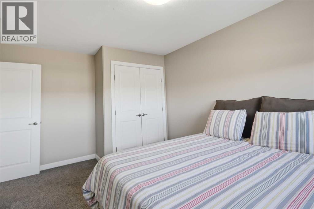 70 Mitchell Crescent, Blackfalds, Alberta  T4M 0H6 - Photo 34 - A2349436