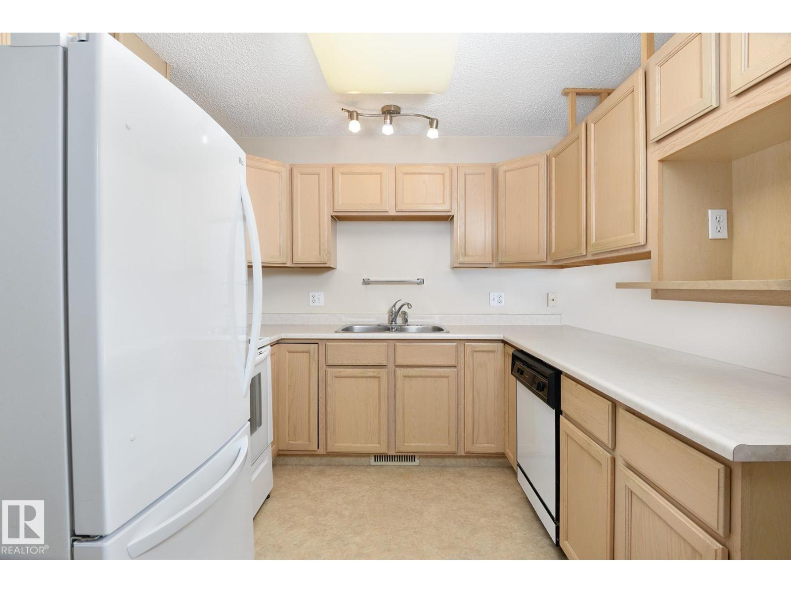 #27 13217 155 AV NW