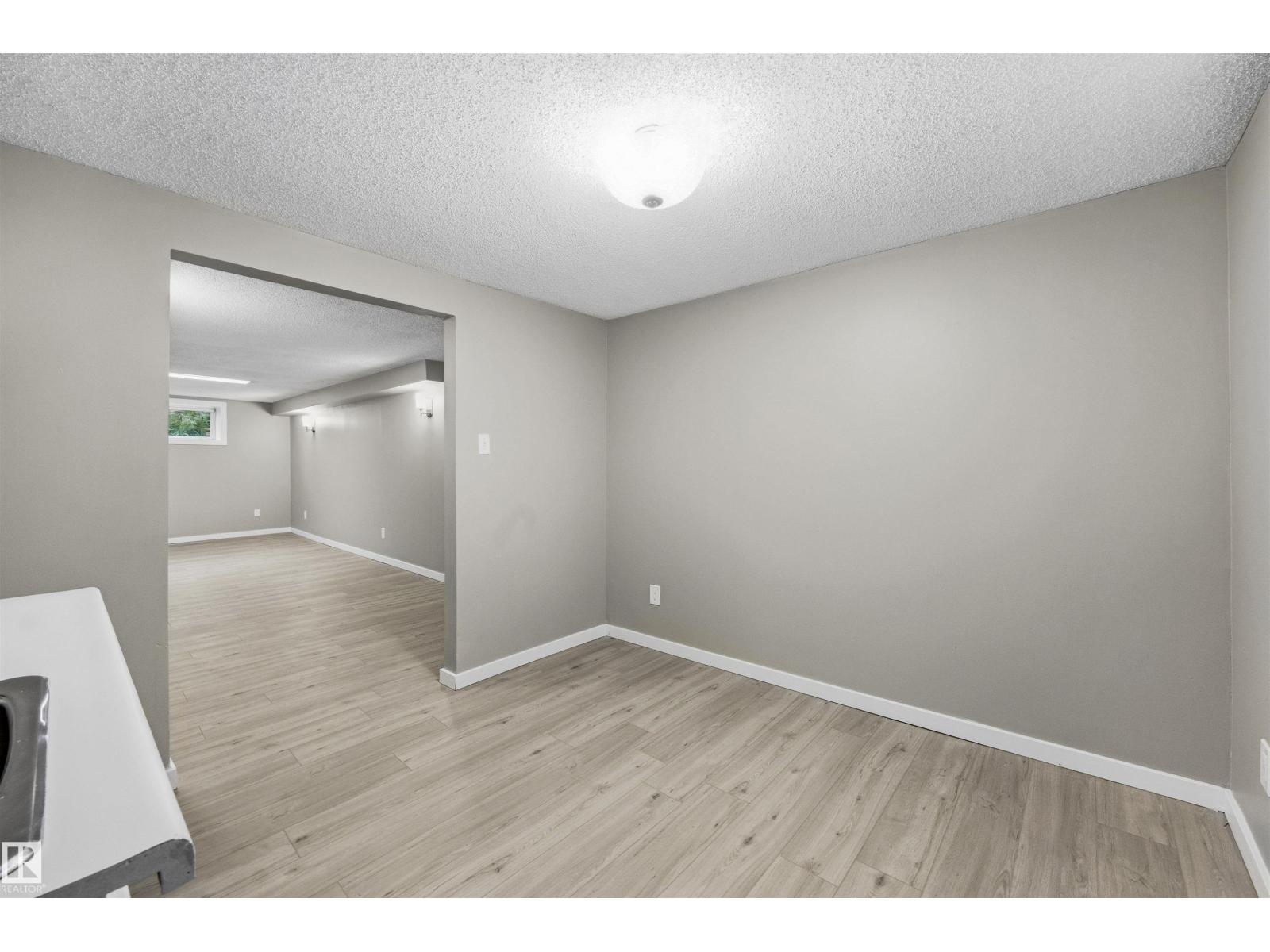 7715 76 AV NW