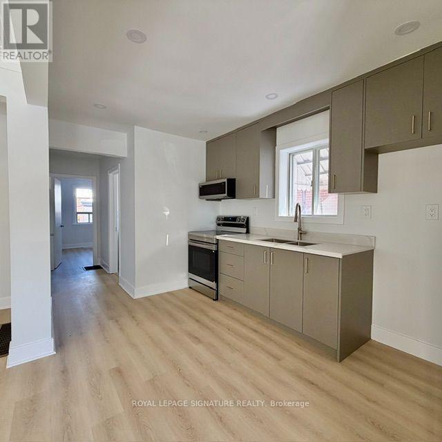 293 Glebemount Avenue, Toronto, Ontario  M4C 3V4 - Photo 6 - E13870834