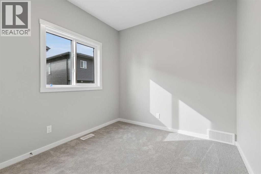 111 Heritage Ridge, Cochrane, Alberta  T4C 2J8 - Photo 15 - A2348731