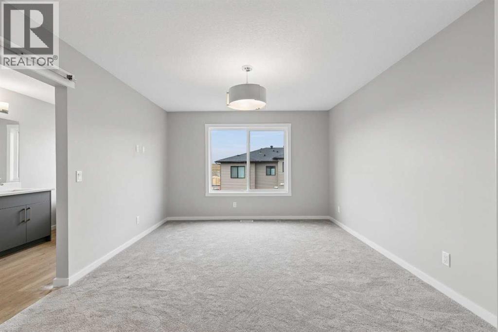 111 Heritage Ridge, Cochrane, Alberta  T4C 2J8 - Photo 23 - A2348731