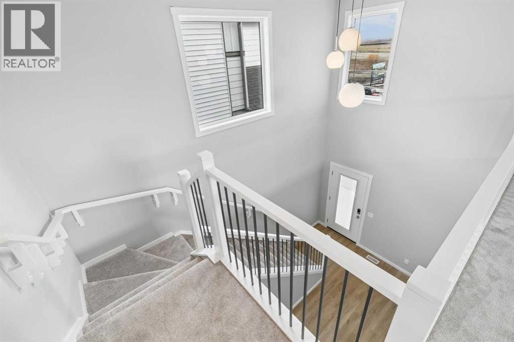111 Heritage Ridge, Cochrane, Alberta  T4C 2J8 - Photo 32 - A2348731
