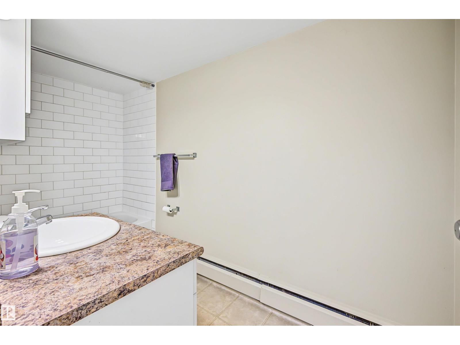 #309 9710 105 ST NW