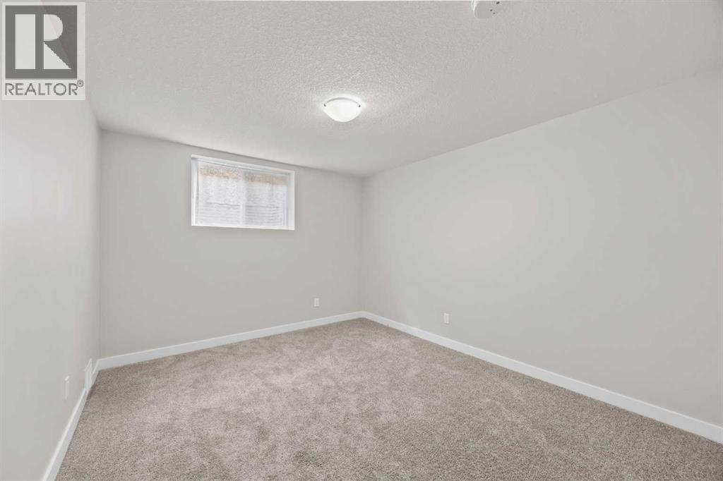 48 Selkirk Drive SW, Calgary, Alberta  T2W 0M2 - Photo 31 - A2349584