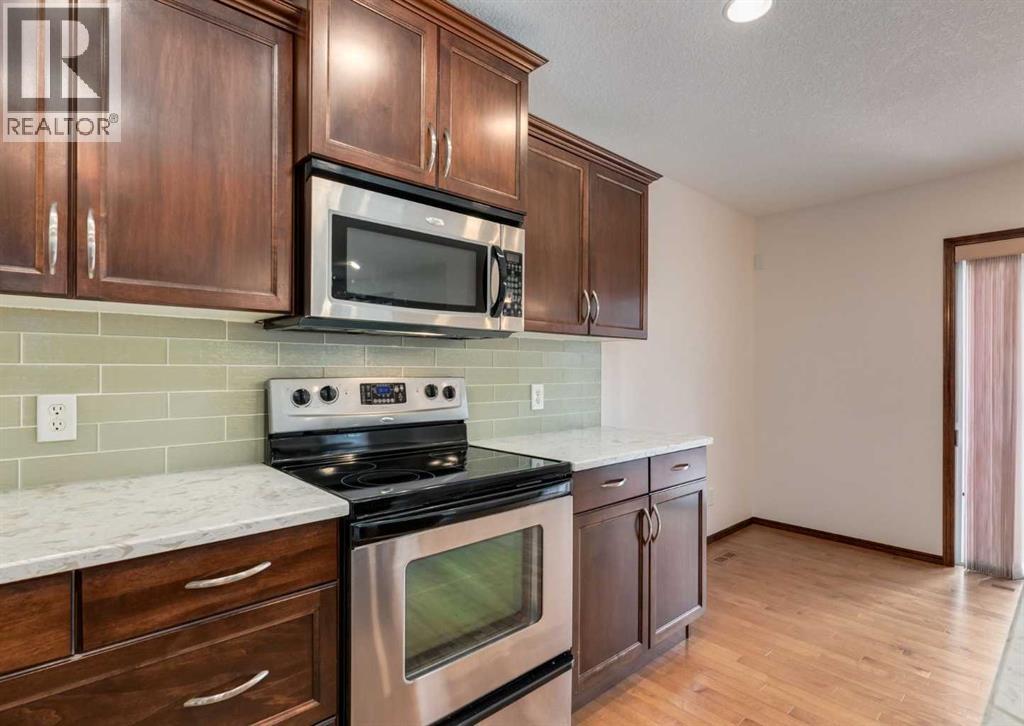 424 Hidden Creek Boulevard Nw, Calgary, Alberta  T3K 6J1 - Photo 15 - A2350920