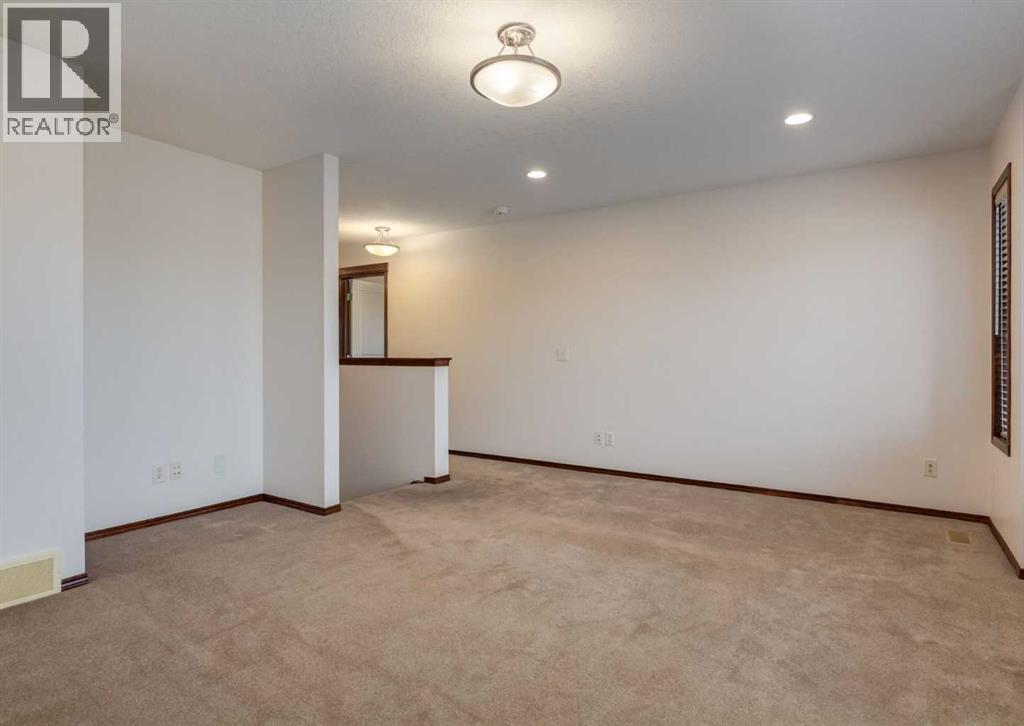 424 Hidden Creek Boulevard Nw, Calgary, Alberta  T3K 6J1 - Photo 32 - A2350920