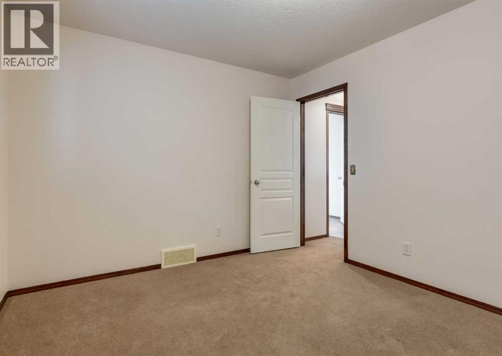424 Hidden Creek Boulevard Nw, Calgary, Alberta  T3K 6J1 - Photo 34 - A2350920