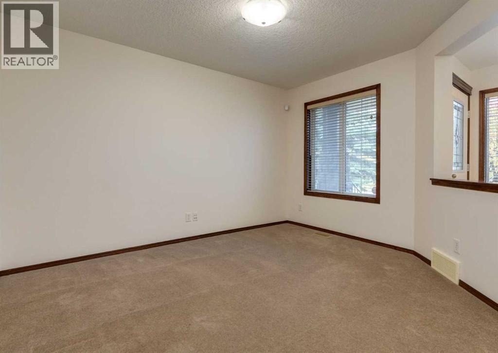 424 Hidden Creek Boulevard Nw, Calgary, Alberta  T3K 6J1 - Photo 4 - A2350920