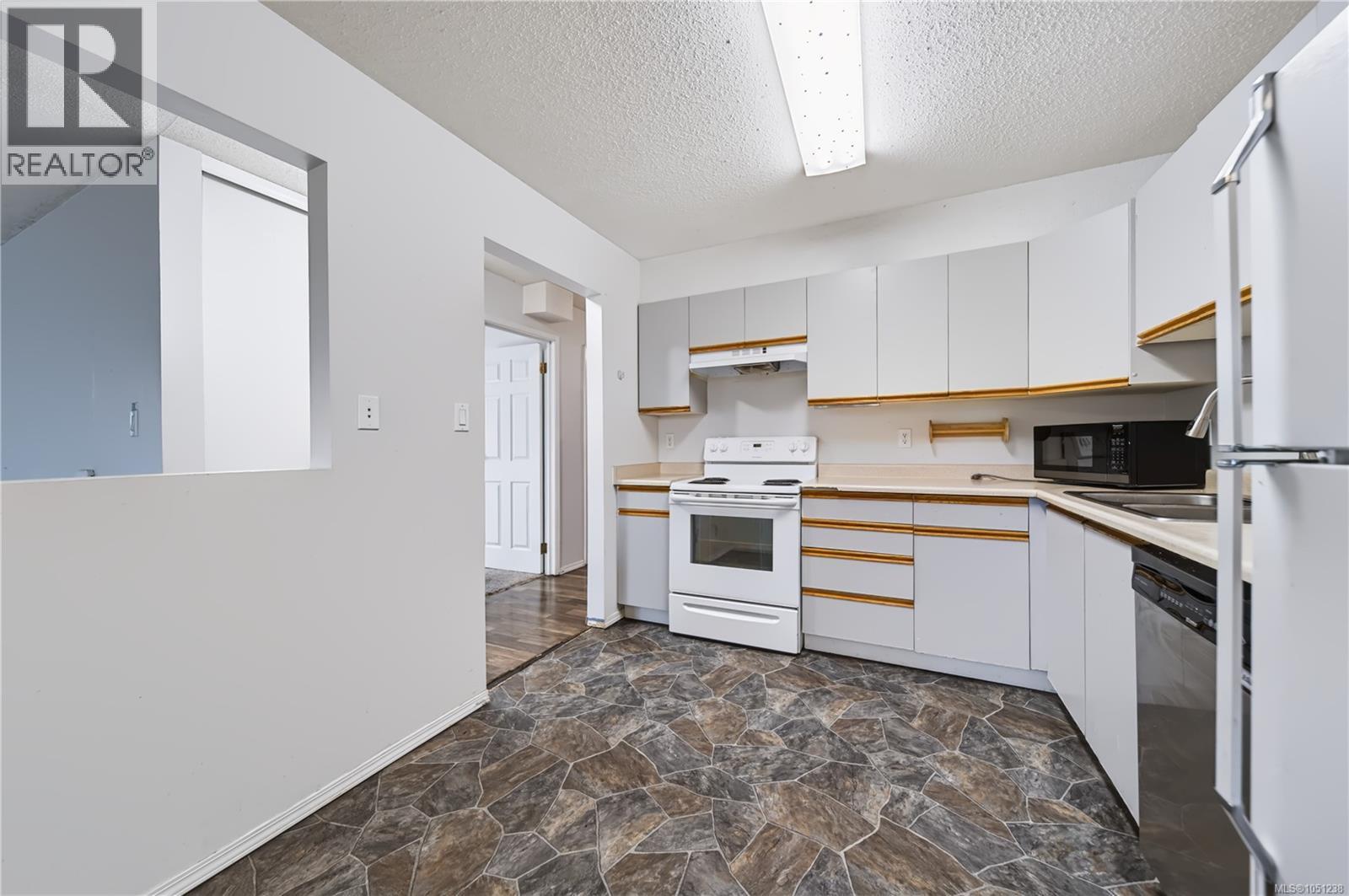 101 6715 Dover Rd, Nanaimo, British Columbia  V9V 1L8 - Photo 5 - 1051238