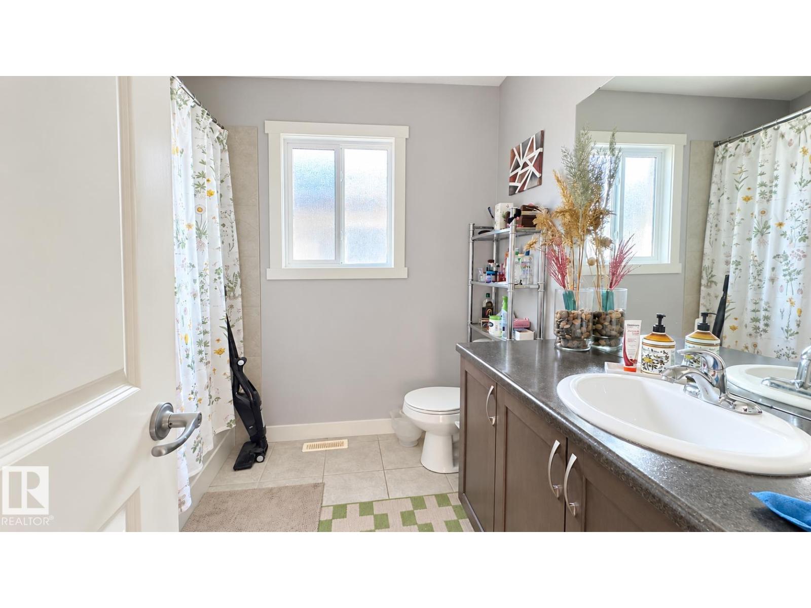 8753 180A AV NW