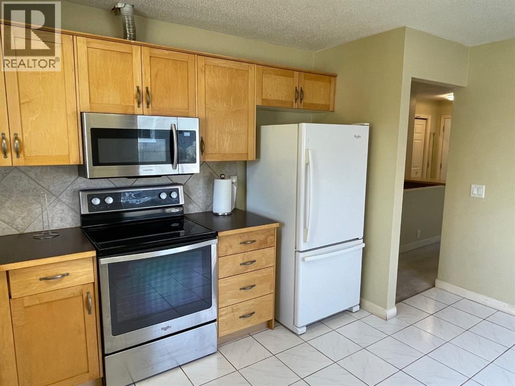 247 Bracewood Road SW, Calgary, Alberta  T2W 3C2 - Photo 7 - A2346722