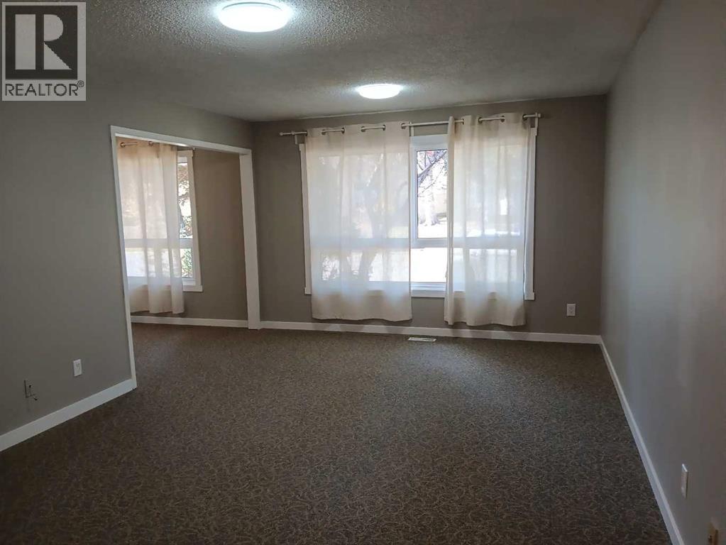 235 Shawcliffe Circle SW, Calgary, Alberta  T2Y 1E8 - Photo 6 - A2347155