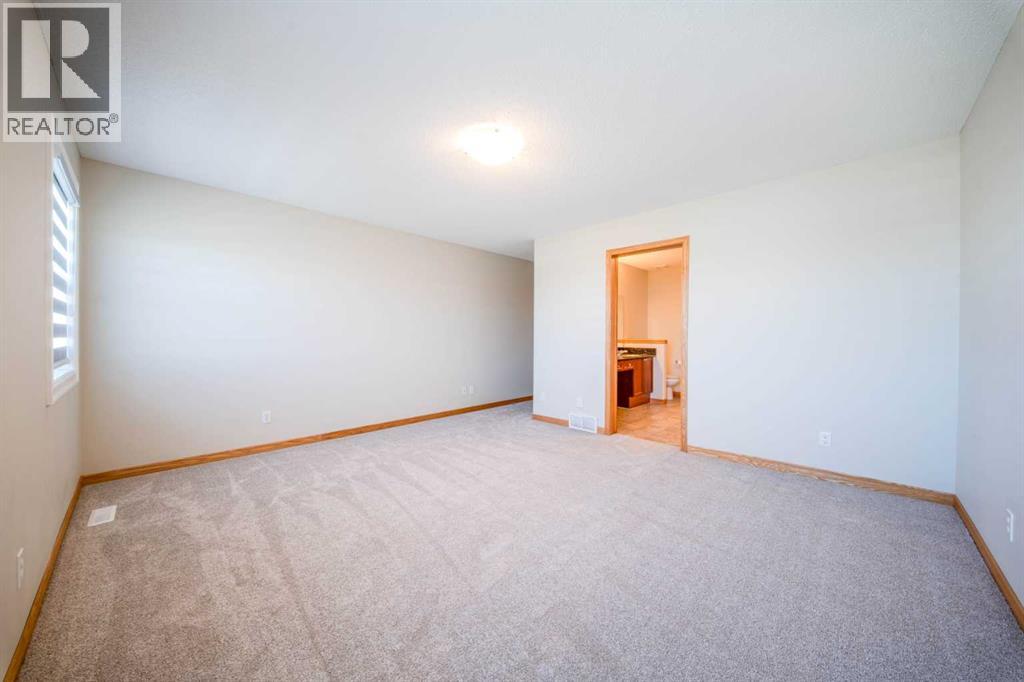 38 Everhollow Rise SW, Calgary, Alberta  T2Y 5H2 - Photo 14 - A2350532