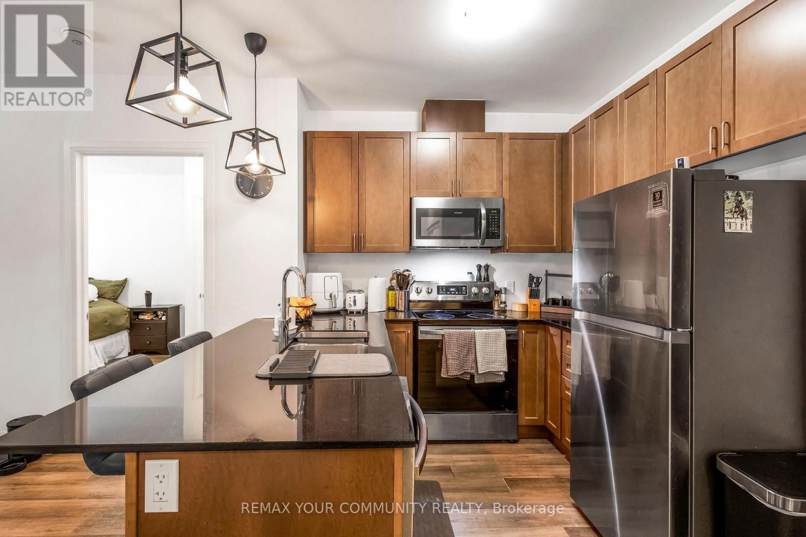 110 - 102 Grovewood Common Circle, Oakville, Ontario  L6H 0X2 - Photo 3 - W13876594