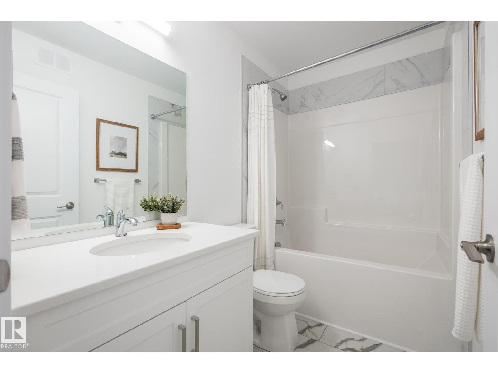 307 158 AV NE