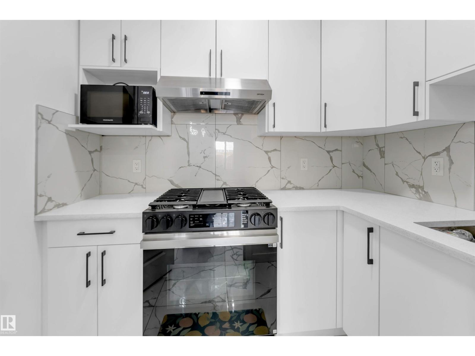 1428 11 AV NW