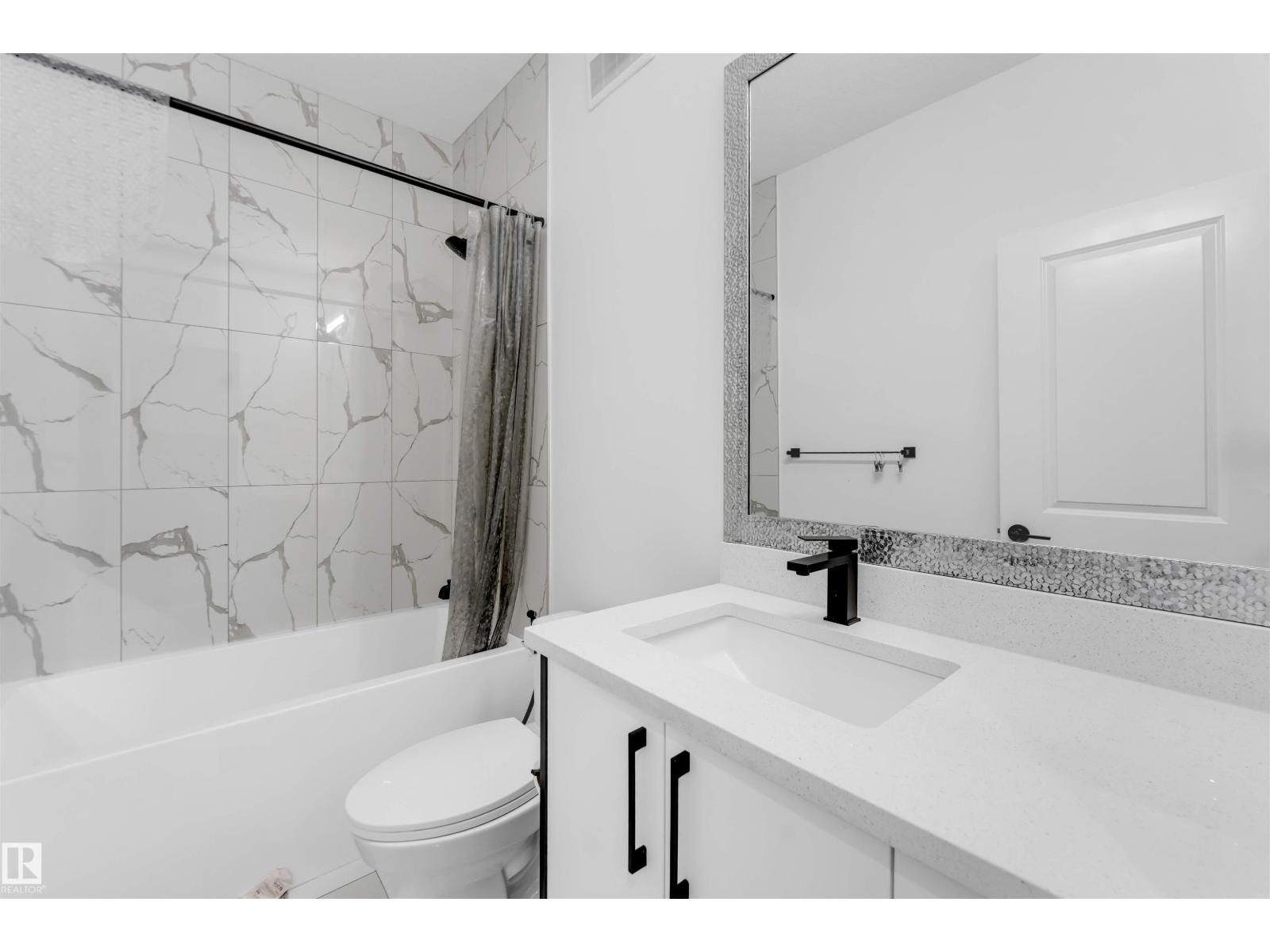 1428 11 AV NW
