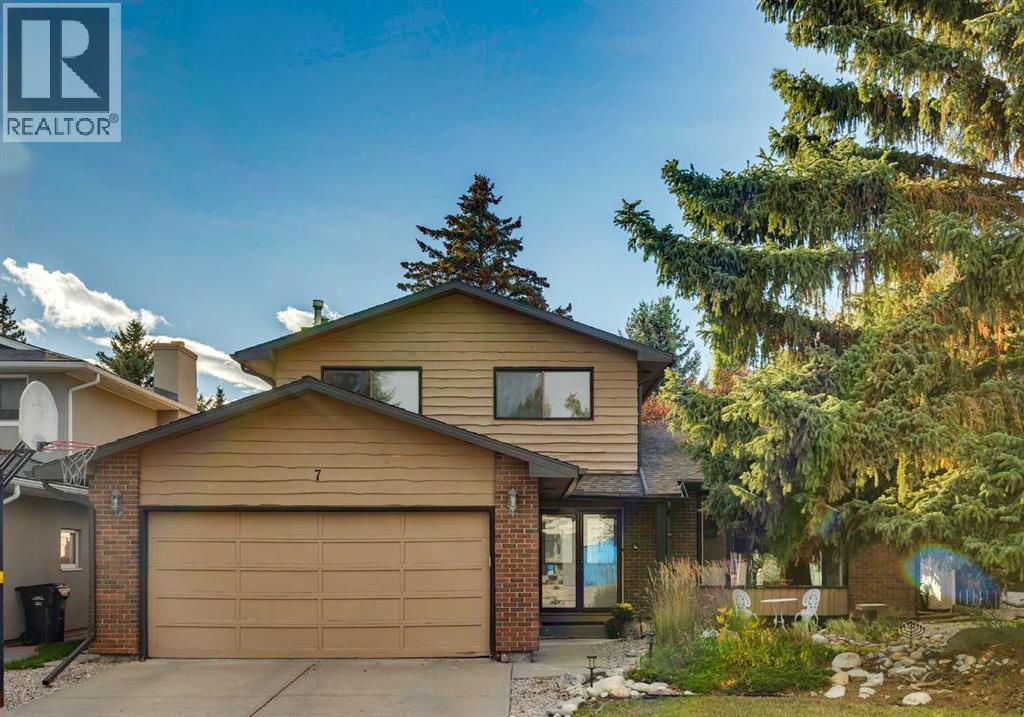 7 Woodgreen Crescent SW, Calgary, Alberta  T2W 4A4 - Photo 1 - A2349261
