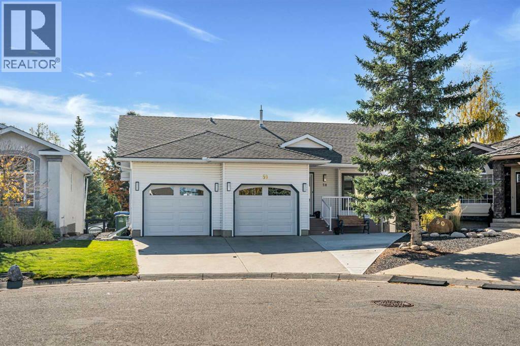 58 Sandstone Ridge Crescent, Okotoks, Alberta  T1S 1P9 - Photo 1 - A2338446