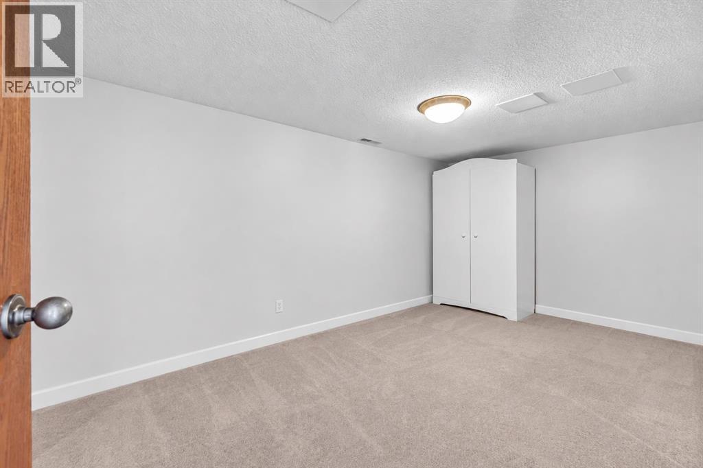 58 Sandstone Ridge Crescent, Okotoks, Alberta  T1S 1P9 - Photo 41 - A2338446