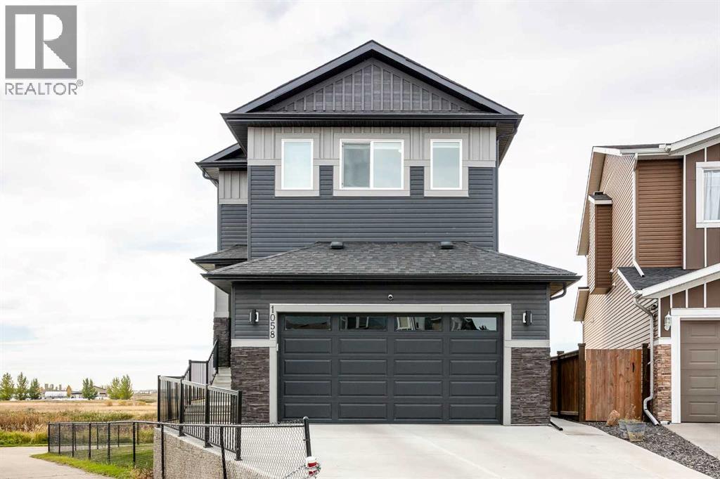 1058 Stevens Place, Crossfield, Alberta  T0M 0S0 - Photo 3 - A2350374