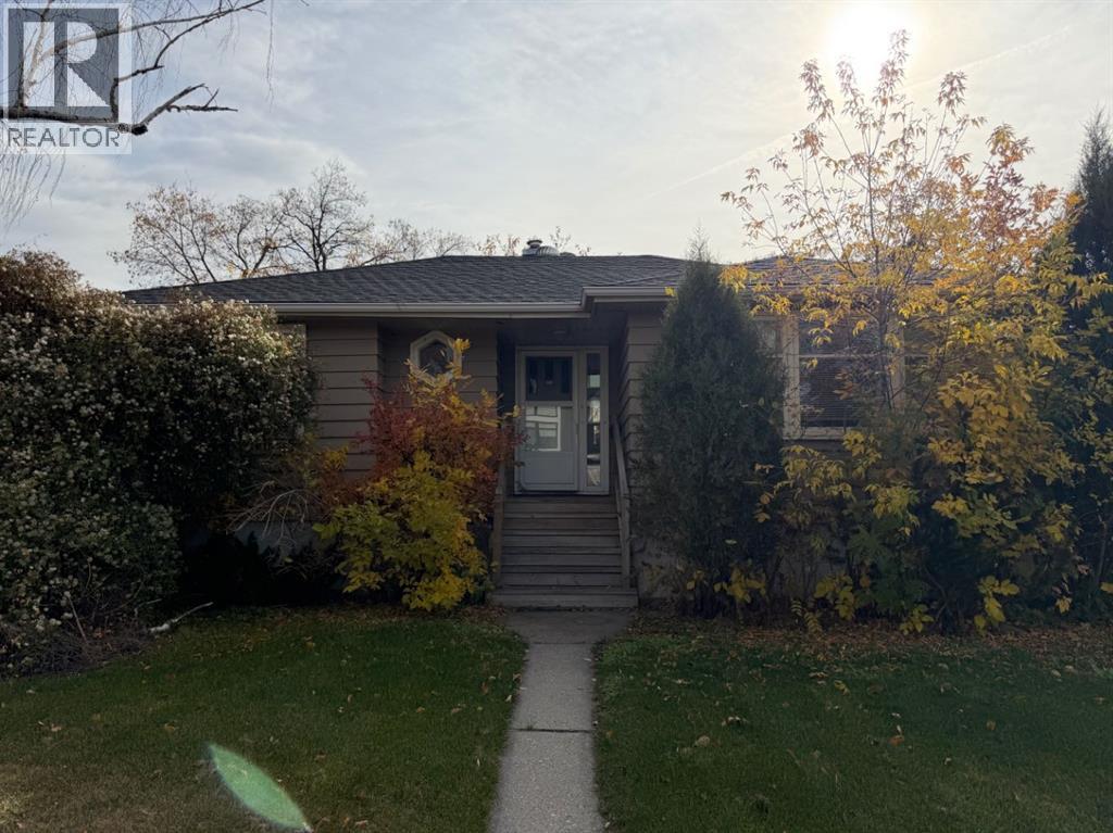 704 33 Street NW, Calgary, Alberta  T2N 2W6 - Photo 3 - A2351232