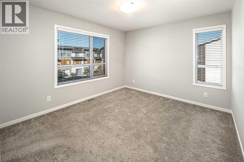 209 Harvest Hills Common NE, Calgary, Alberta  T3K 2M7 - Photo 9 - A2351137
