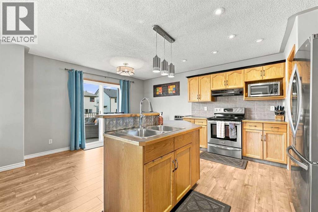 2 Cimarron Grove Bay, Okotoks, Alberta  T1S 2H3 - Photo 8 - A2348819
